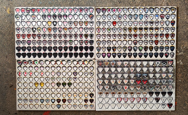 Boards of finished custom picks made for artists